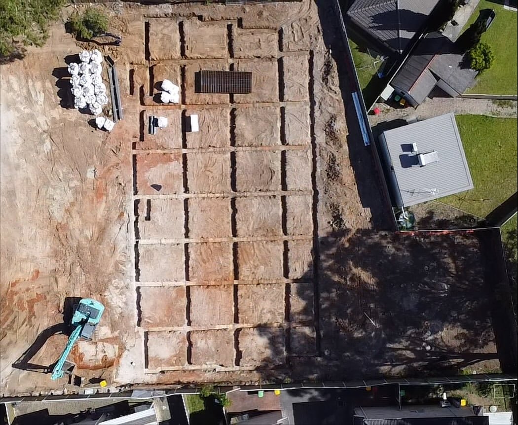 Grid of footing trenches, top-down drone view